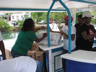 Image #9 - Hurricane Tomas Relief Effort (Packing the goods)